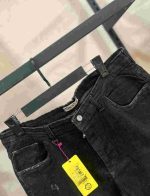 شلوار جین زنانه سایز بزرگ مدل مام‌فیت مشکی  (Distressed Black Jeans)** - Image 2
